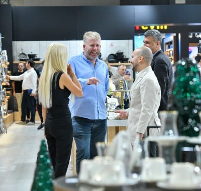 visitors and exhibitors meeting at the stand